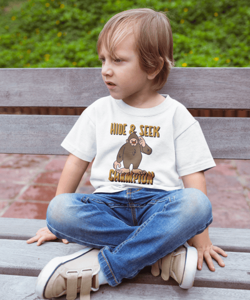 sad kid wearing a tshirt mockup sitting on a bench a17954( white )