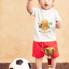 t shirt mockup of a little boy with a soccer ball and a trophy 43081 r el2
