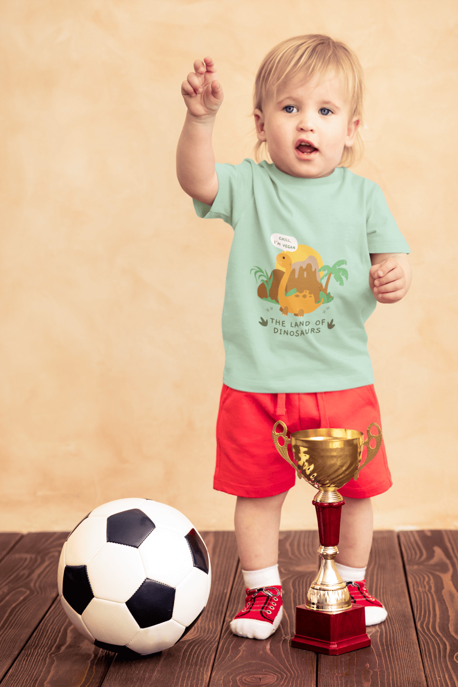 t shirt mockup of a little boy with a soccer ball and a trophy 43081 r el2 (5)