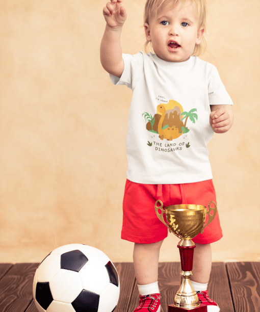 t shirt mockup of a little boy with a soccer ball and a trophy 43081 r el2