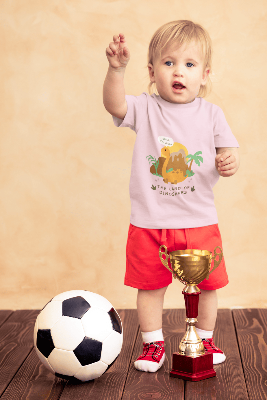 t shirt mockup of a little boy with a soccer ball and a trophy 43081 r el2 (6)