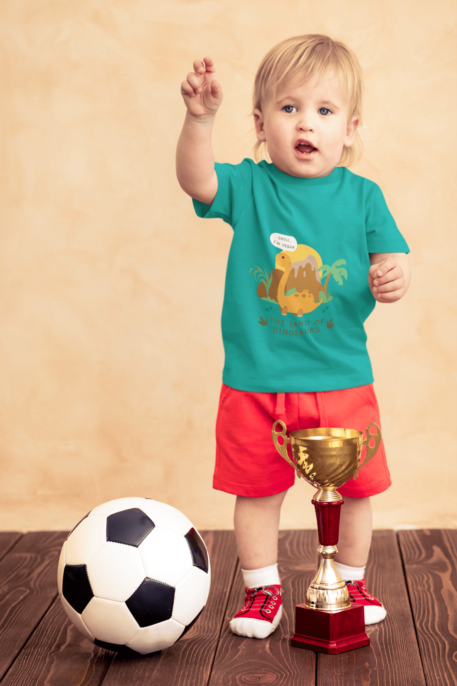 t shirt mockup of a little boy with a soccer ball and a trophy 43081 r el2 (7)